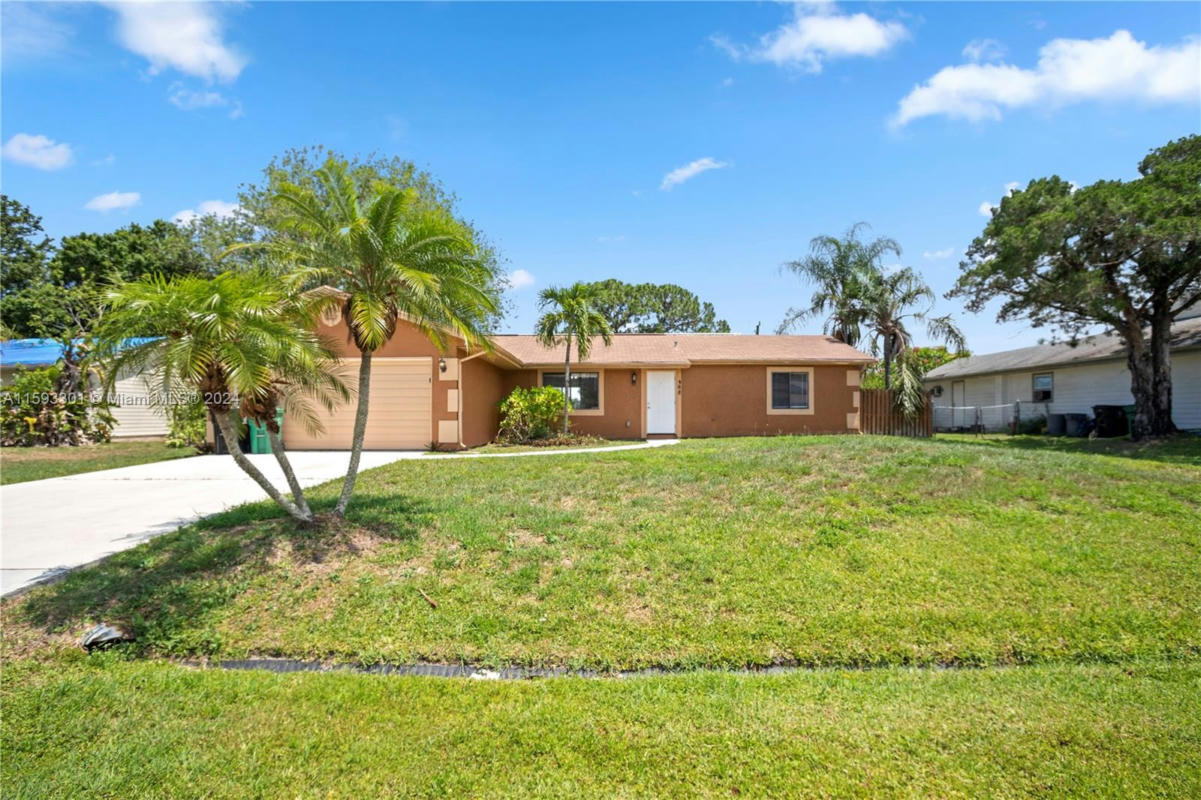 468 SW MOLLOY ST, PORT ST. LUCIE, FL 34984, photo 1 of 14