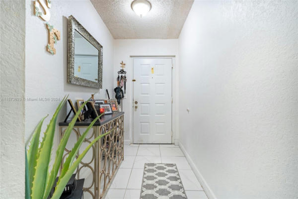 8323 LAKE DR APT 303, DORAL, FL 33166, photo 2 of 29