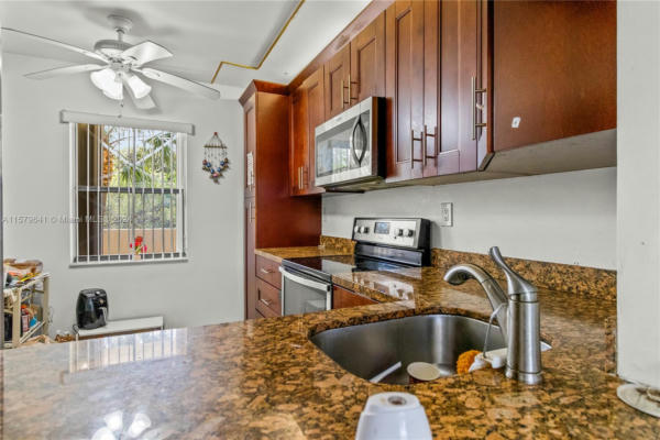 2900 NW 42ND AVE APT A302, COCONUT CREEK, FL 33066, photo 2 of 36