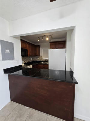 816 NW 87TH AVE APT 406, MIAMI, FL 33172, photo 4 of 31