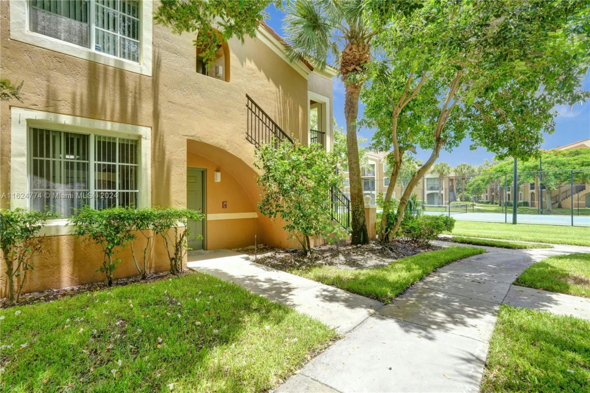 8010 N NOB HILL RD APT 108, TAMARAC, FL 33321, photo 1 of 35