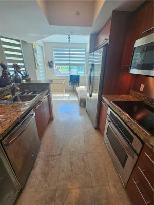 110 WASHINGTON AVE APT 1319, MIAMI BEACH, FL 33139, photo 4 of 21