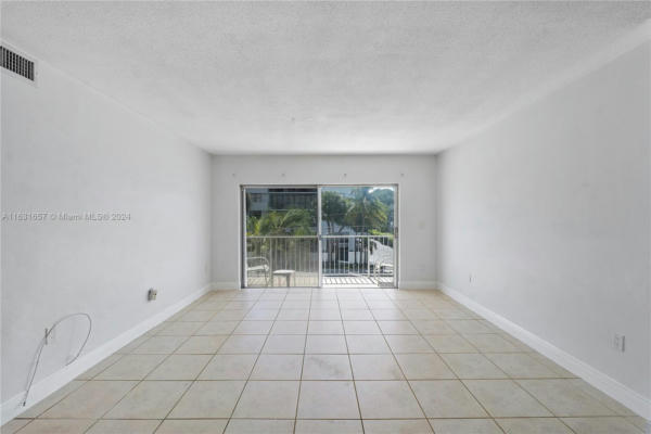 1075 92ND ST APT 201, BAY HARBOR ISLANDS, FL 33154, photo 2 of 29