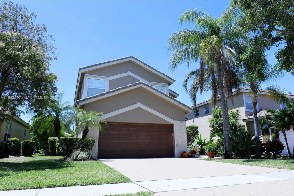 7673 NW 70TH AVE, PARKLAND, FL 33067, photo 1 of 50