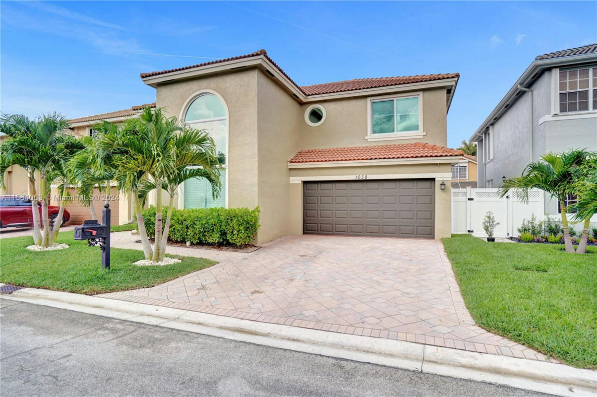 1038 NW 116TH AVE, CORAL SPRINGS, FL 33071, photo 1 of 60