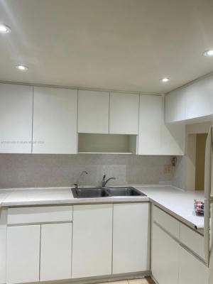 1900 W 68TH ST APT C202, HIALEAH, FL 33014 - Image 1