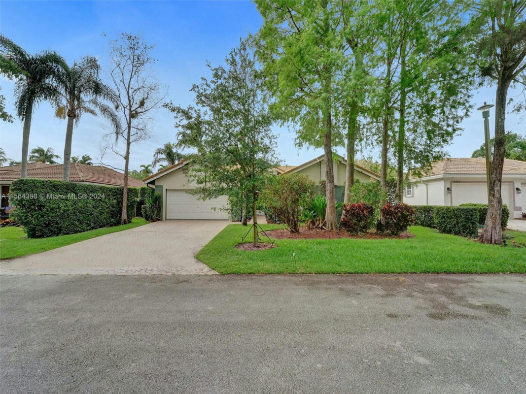 4242 NW 66TH ST, COCONUT CREEK, FL 33073, photo 1 of 31