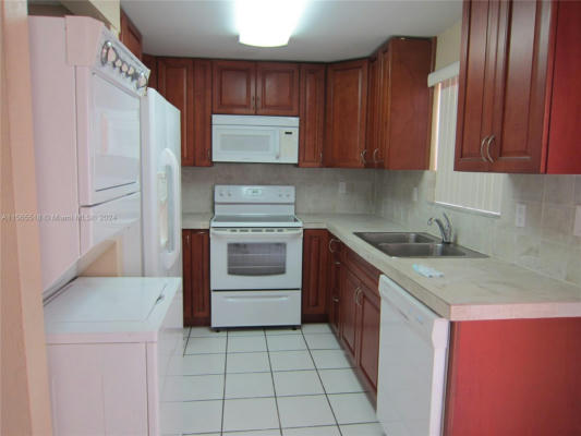 10 SW 108TH AVE APT E8, SWEETWATER, FL 33174, photo 2 of 36