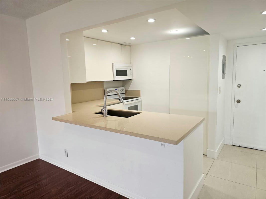 100 EDGEWATER DR APT 244, CORAL GABLES, FL 33133, photo 1 of 41