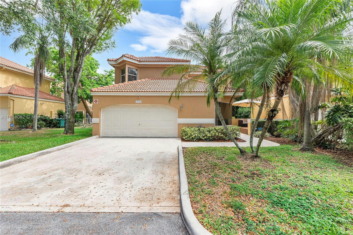 11375 LAKEVIEW DR, CORAL SPRINGS, FL 33071, photo 1 of 40