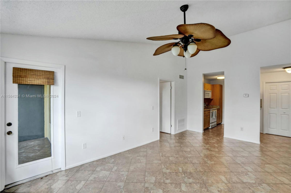 4401 W MCNAB RD APT 20, POMPANO BEACH, FL 33069, photo 1 of 45