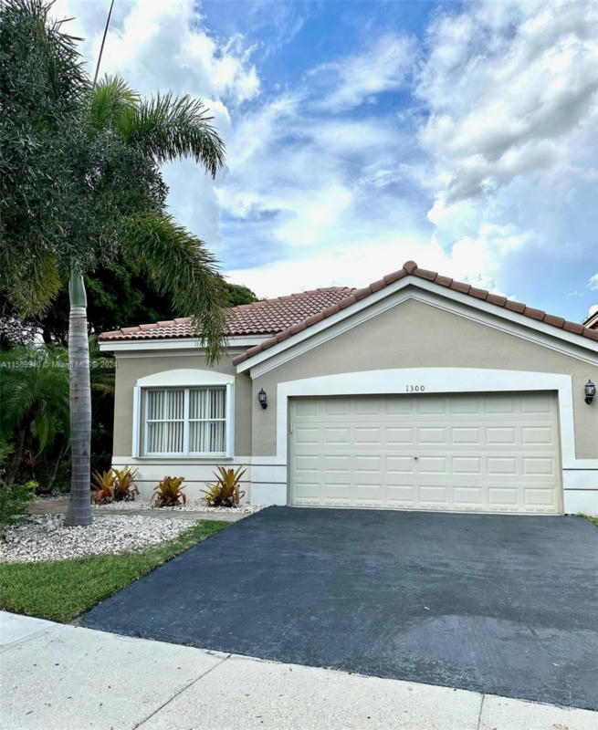 1300 CHINABERRY DR, WESTON, FL 33327, photo 1 of 35
