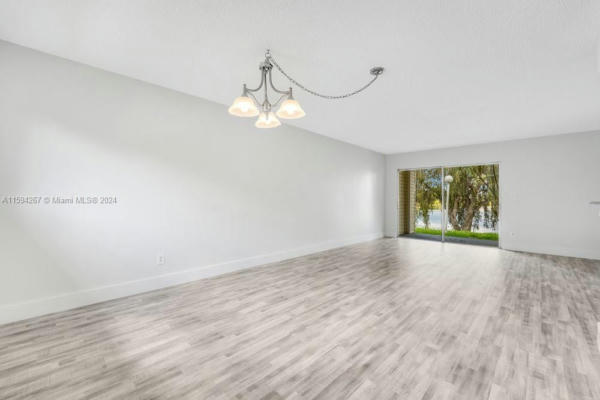 3477 NW 44TH ST APT 105, OAKLAND PARK, FL 33309, photo 2 of 31