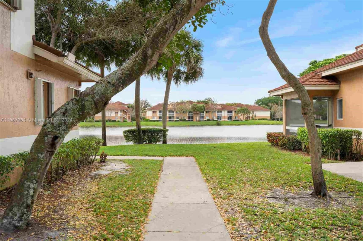 775 NW 91ST TER # 775, PLANTATION, FL 33324, photo 1 of 35