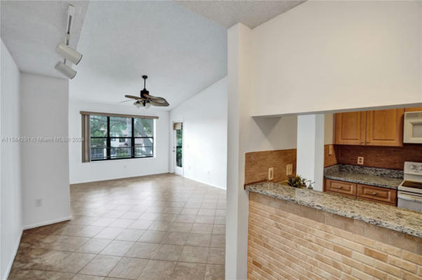 4401 W MCNAB RD APT 20, POMPANO BEACH, FL 33069, photo 3 of 45