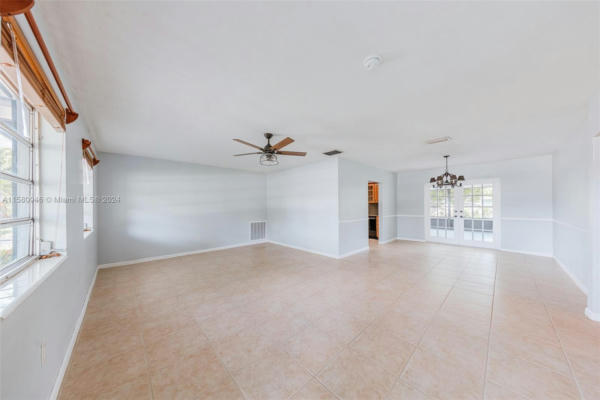 525 NW 14TH ST, HOMESTEAD, FL 33030, photo 4 of 36