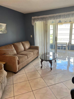 3051 NW 46TH AVE APT 305, LAUDERDALE LAKES, FL 33313, photo 3 of 42