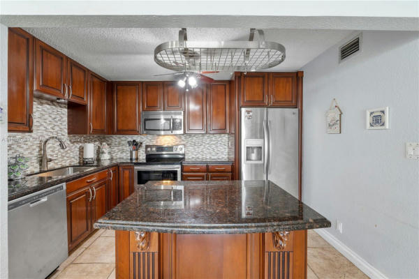 4137 NW 88TH AVE APT 106, CORAL SPRINGS, FL 33065, photo 3 of 36